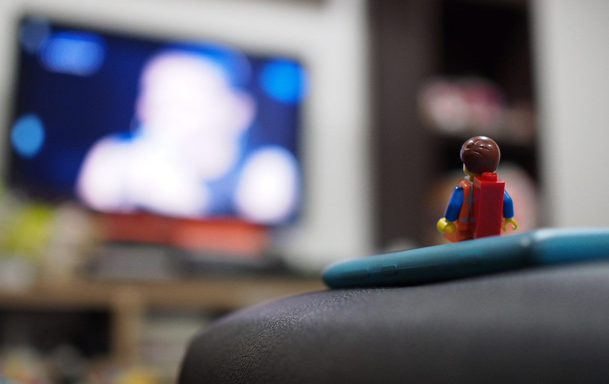 lego man watches TV